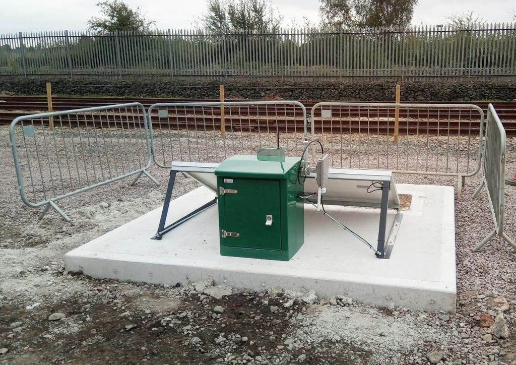 EnviroHub Control Module and solar panel on concrete base