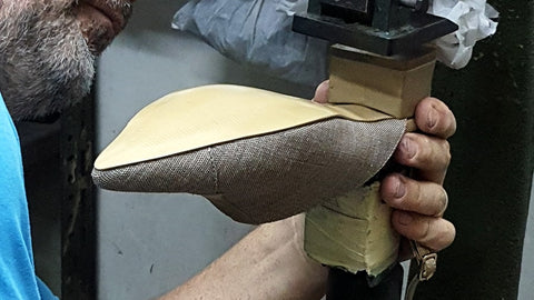 hand crafting leather shoe