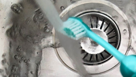 Cleaning White Leather Shoes with Toothbrush