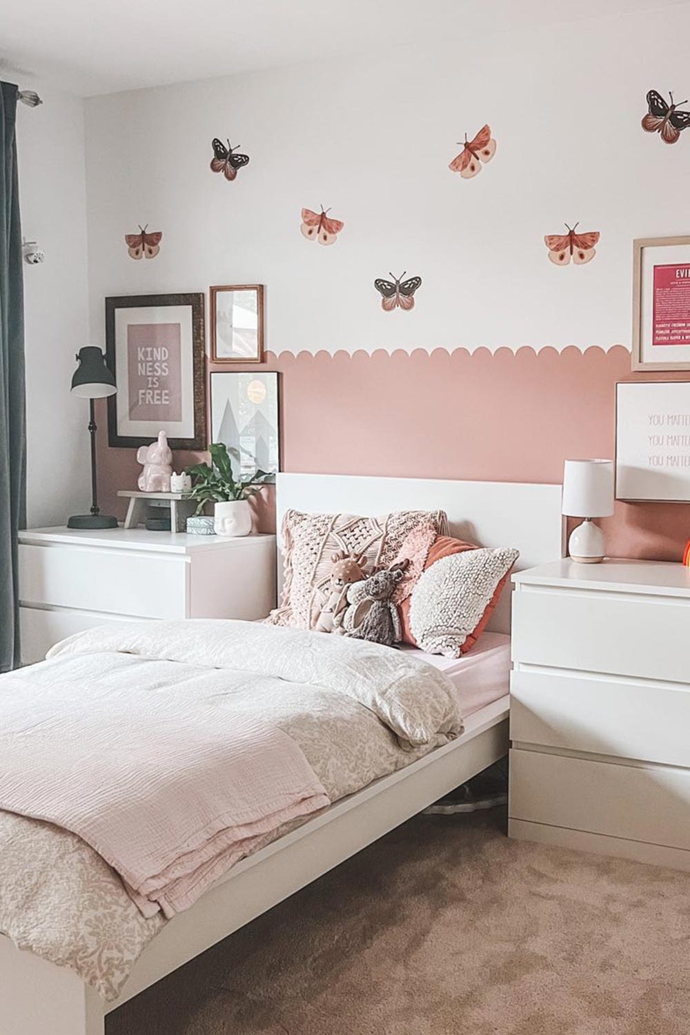 Mini Butterfly Wall Decals in a girls room over pink scallop boarder.