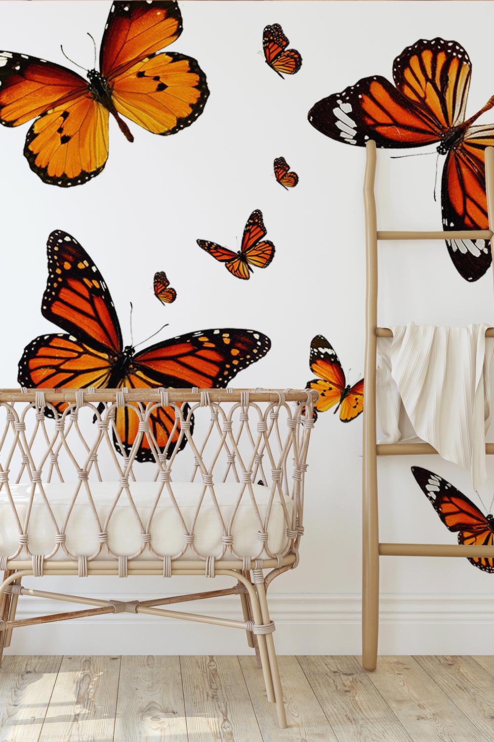 Monarch Butterfly Wall Decals showcased on a neutral nursery wall.