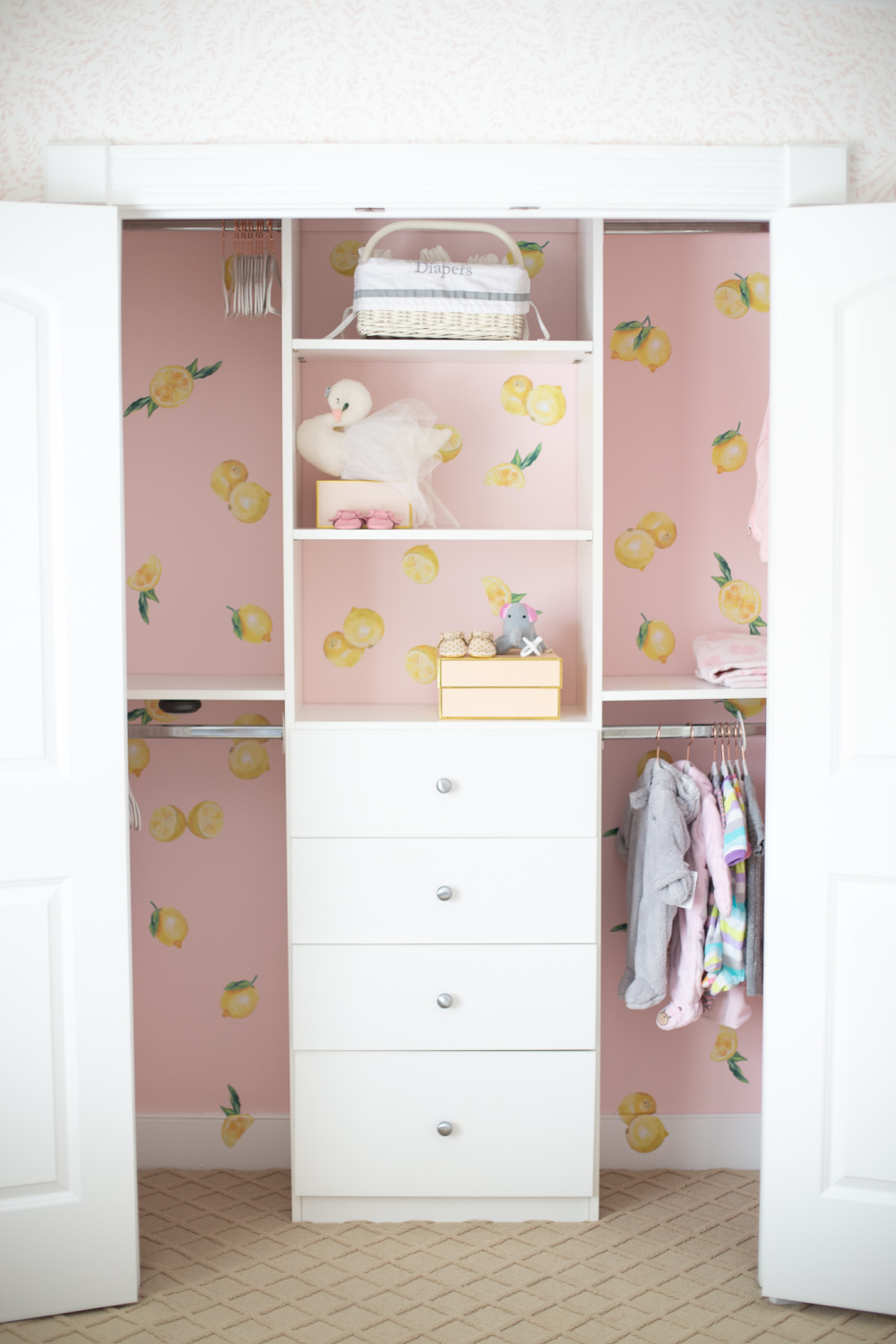 wall decals in small cute pink closet