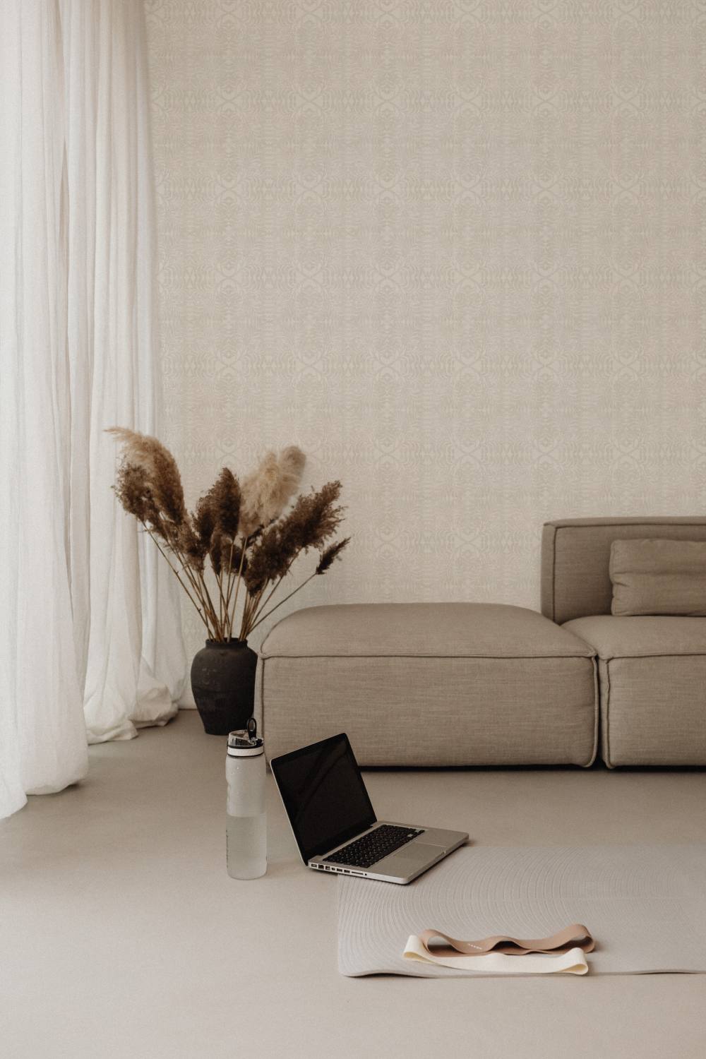 neutral wallpaper in calming beige living room
