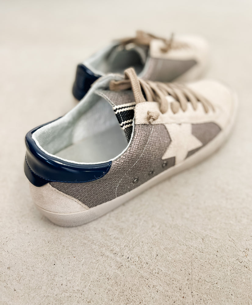 
                  
                    Grey + Navy Star Sneaker
                  
                