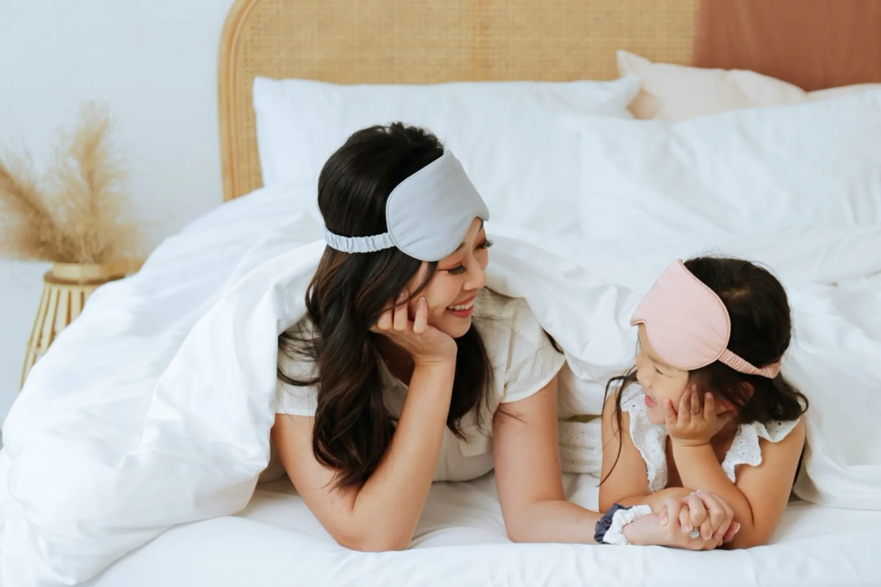 Joyce Lau started Naked Lab in 2018 to bring quality bedding for her then two-month-old daughter, who was battling serious eczema. Joyce Lau is pictured here with her daughter wearing Naked Lab eye masks.
