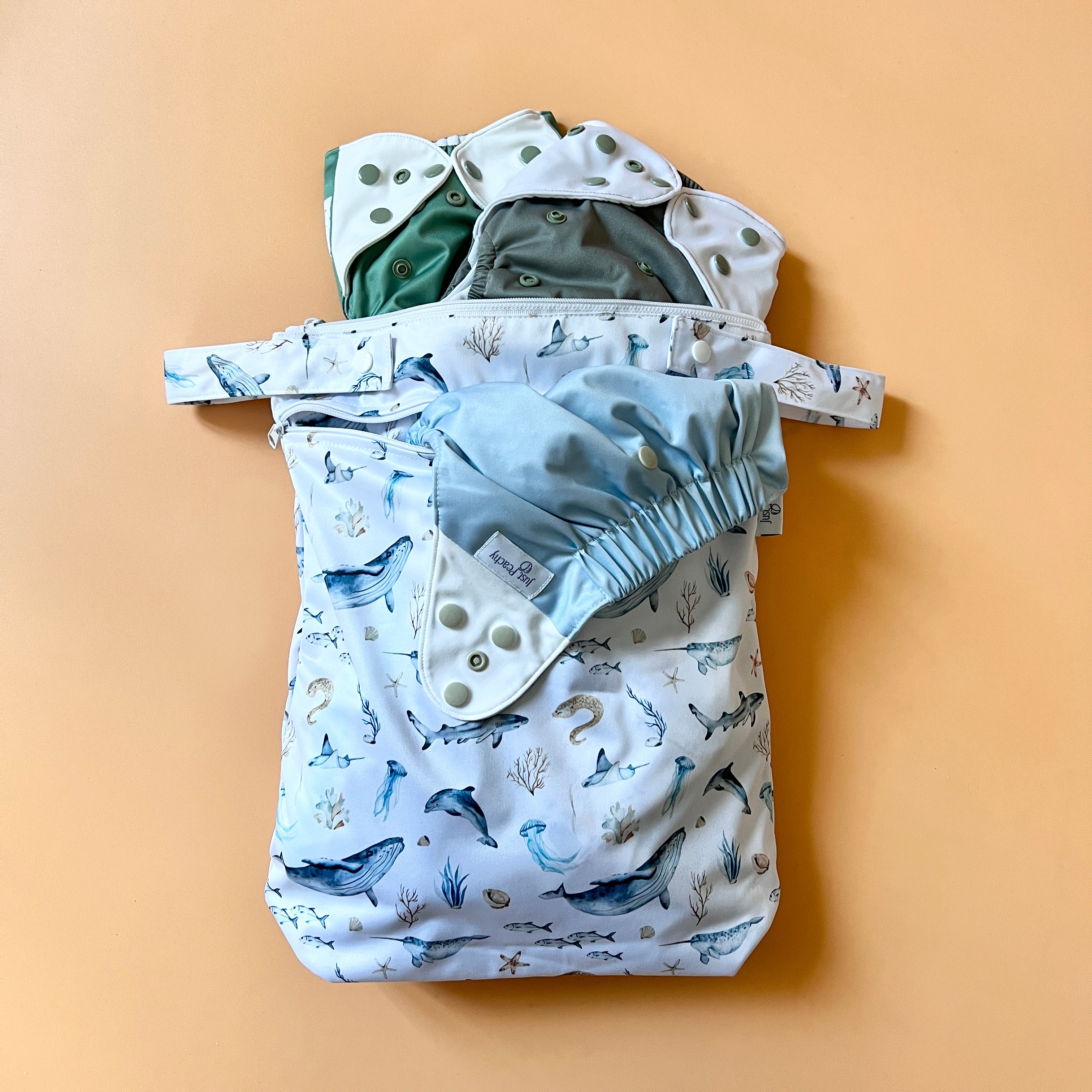 Just Peachy On-The-Go Wet/Dry Bag in Surfs Up with cloth diapers