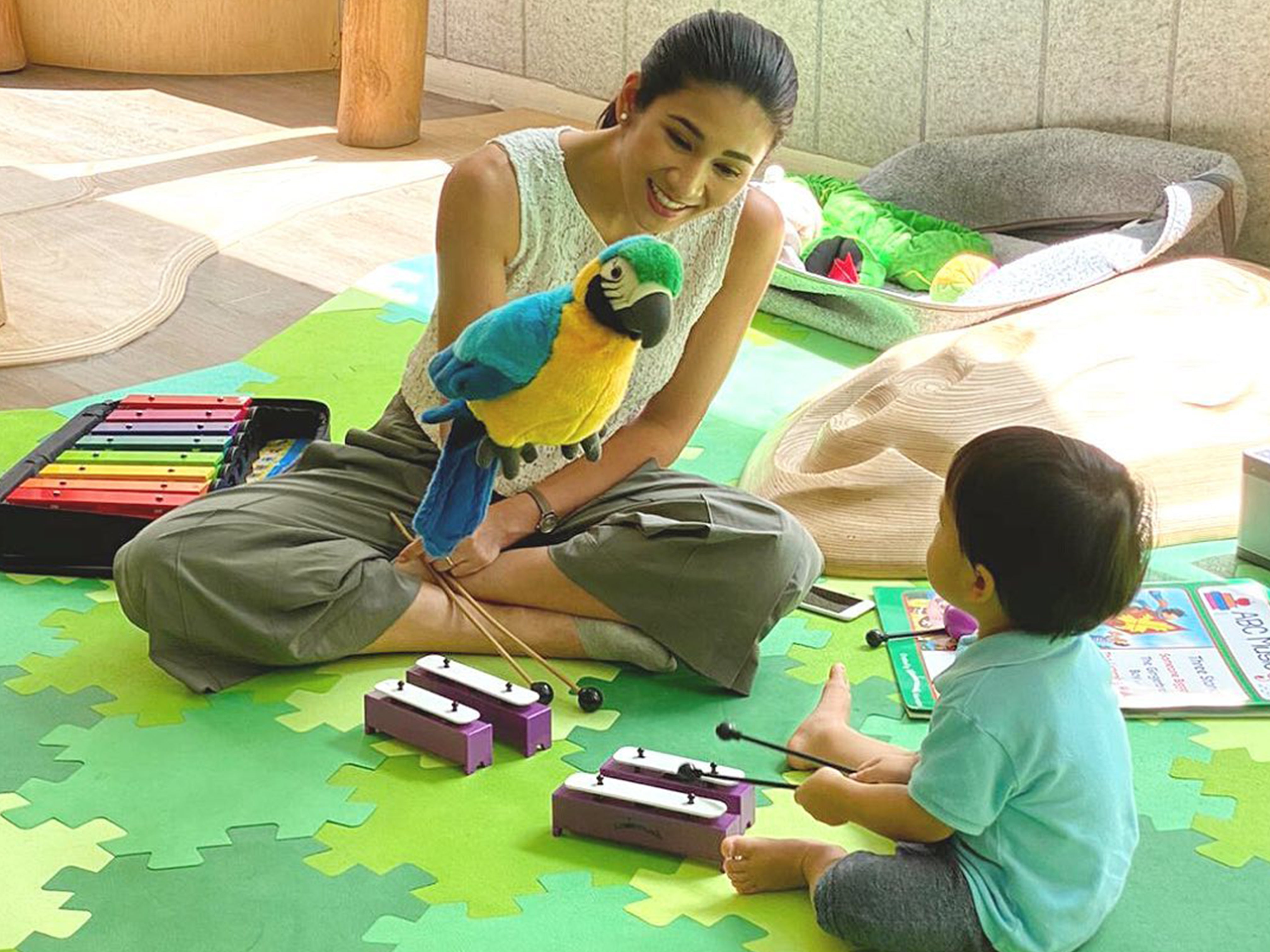 Teacher Crisel engaging her student in a conversation