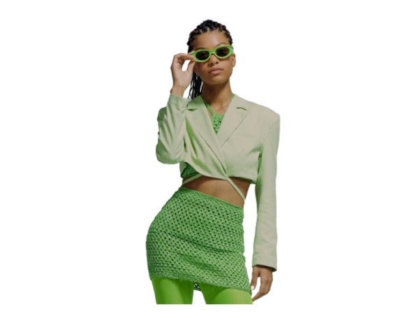 Women in a lime green midi skirt