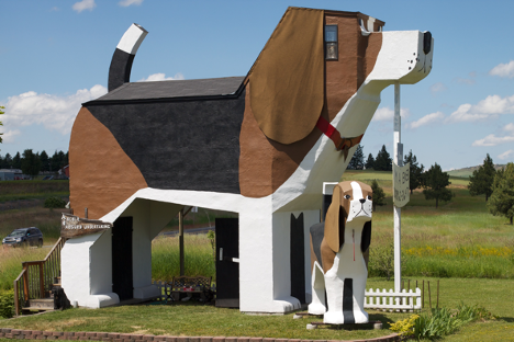 a large wooden beagle shaped Bed and Breakfast