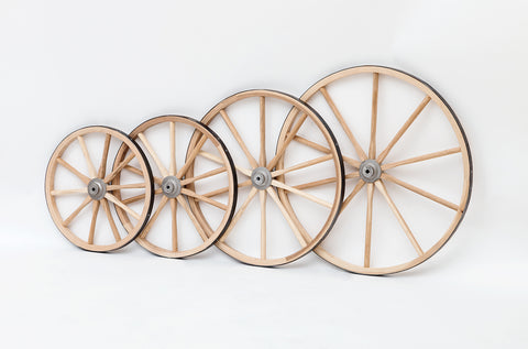 Three light duty wooden cart wheels displayed on a white background