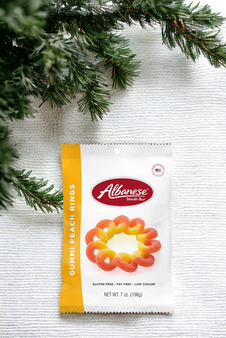 Indulge in the world's best gummy bears with Albanese's peach gummy rings for a delightful treat.