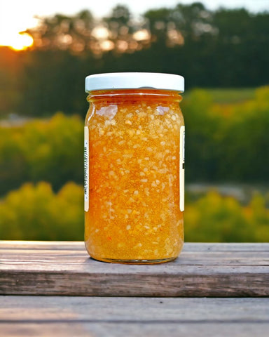 Savor Amish crafted garlic jam strain; our garlic jam enriches foods with homestyle USA quality. Perfect on any dish!