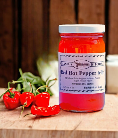 Savor authentic Amish-made Red Hot Pepper Jelly with bold bell and habanero peppers, crafted in the USA for the perfect spicy punch.