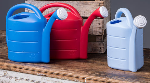 Choose from red, blue or sky blue two gallon watering can from Harvest Array