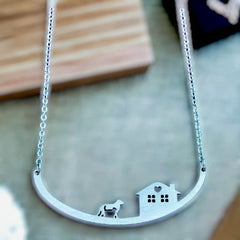 Elegant stainless steel chain necklace, featuring a unique house & pet design, made in the USA.