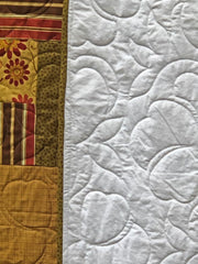 Cotton Blossom Stitching on Fields of Gold Quilt