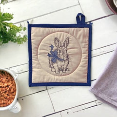 Handmade quilted potholder patterns to enhance your kitchen—decorative, made in America, crafted with care.
