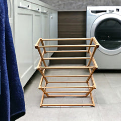 Shop space-saving laundry drying racks: wooden, foldable, durable. Ideal for laundry rooms, quick storage. Free US shipping, quality craftsmanship.