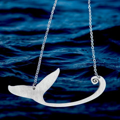 Shop now for a Stainless Steel Whale Tail Necklace, a symbol of splendor, strength, and grace.