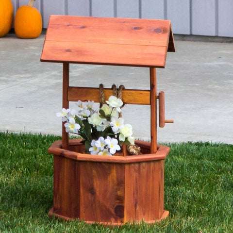 Enhance your outdoor space with our durable Amish-made cedar wishing well. Perfect for garden decor, it adds a charming touch to any patio or yard.