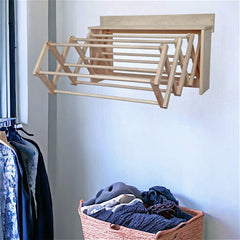 Space-saving wooden laundry drying rack, sturdy & elegantly designed. Easy to mount and extendable for efficient drying.