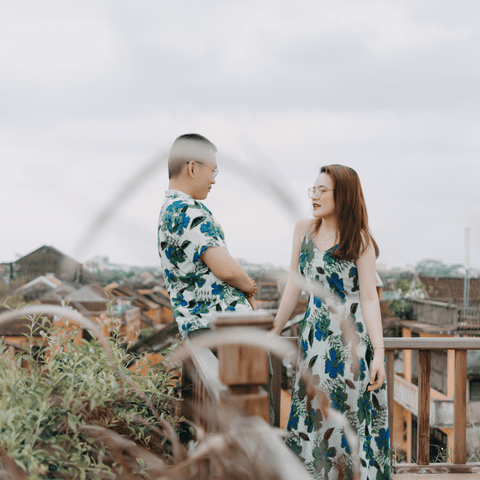 a couple wearing match outfit on a field