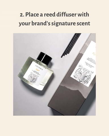 2. Place a reed diffuser with your brand's signature scent