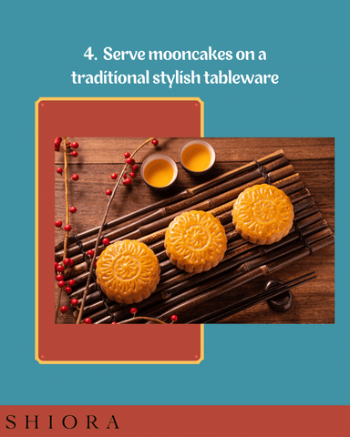 Serve mooncakes on a traditional stylish tableware