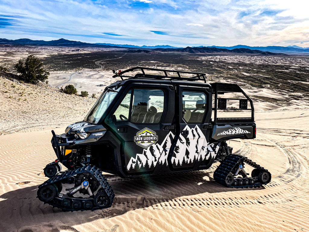 Our UTV with tracks in sand