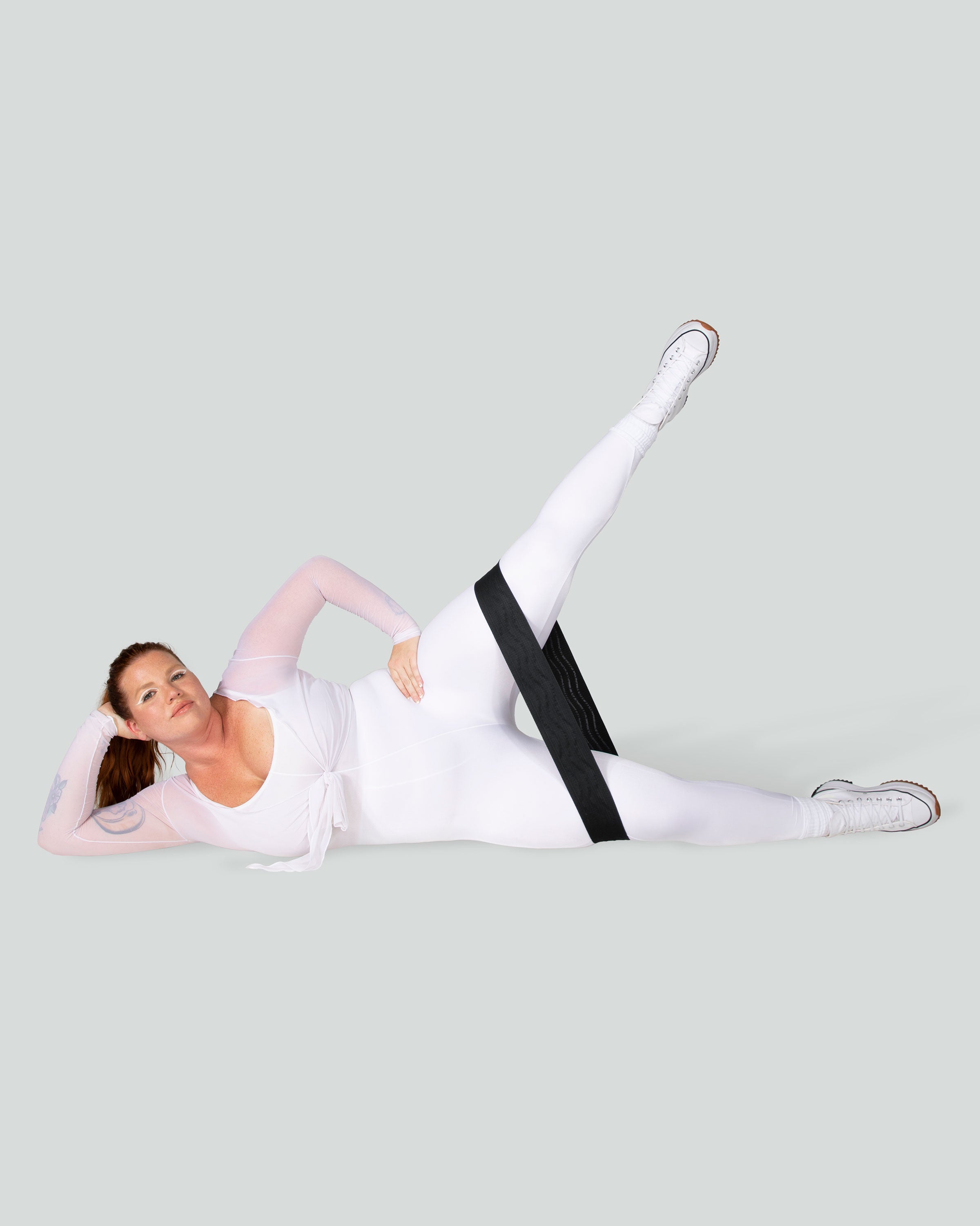 Girl Stretching With Bala Bands