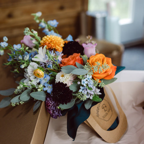 Bouquet displayed in shipping box