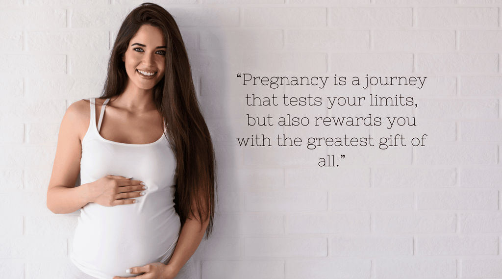 Postpartum Psoriasis - pregnant woman stands beside a white wall, text says “Pregnancy is a journey that tests your limits, but also rewards you with the greatest gift of all.”