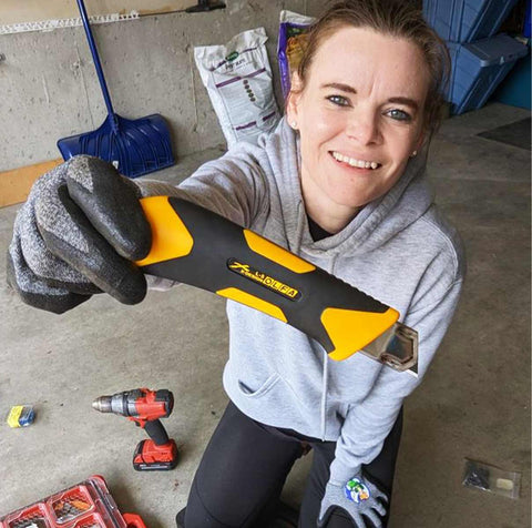 HVAC Apprentice Jess with OLFA tool at work