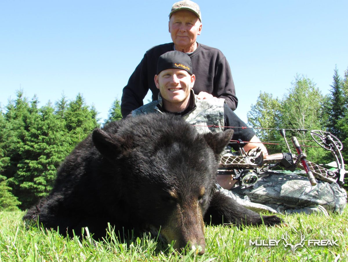 Erik Van Woerkom and Dale Chugg with a successful Canada Black Bear