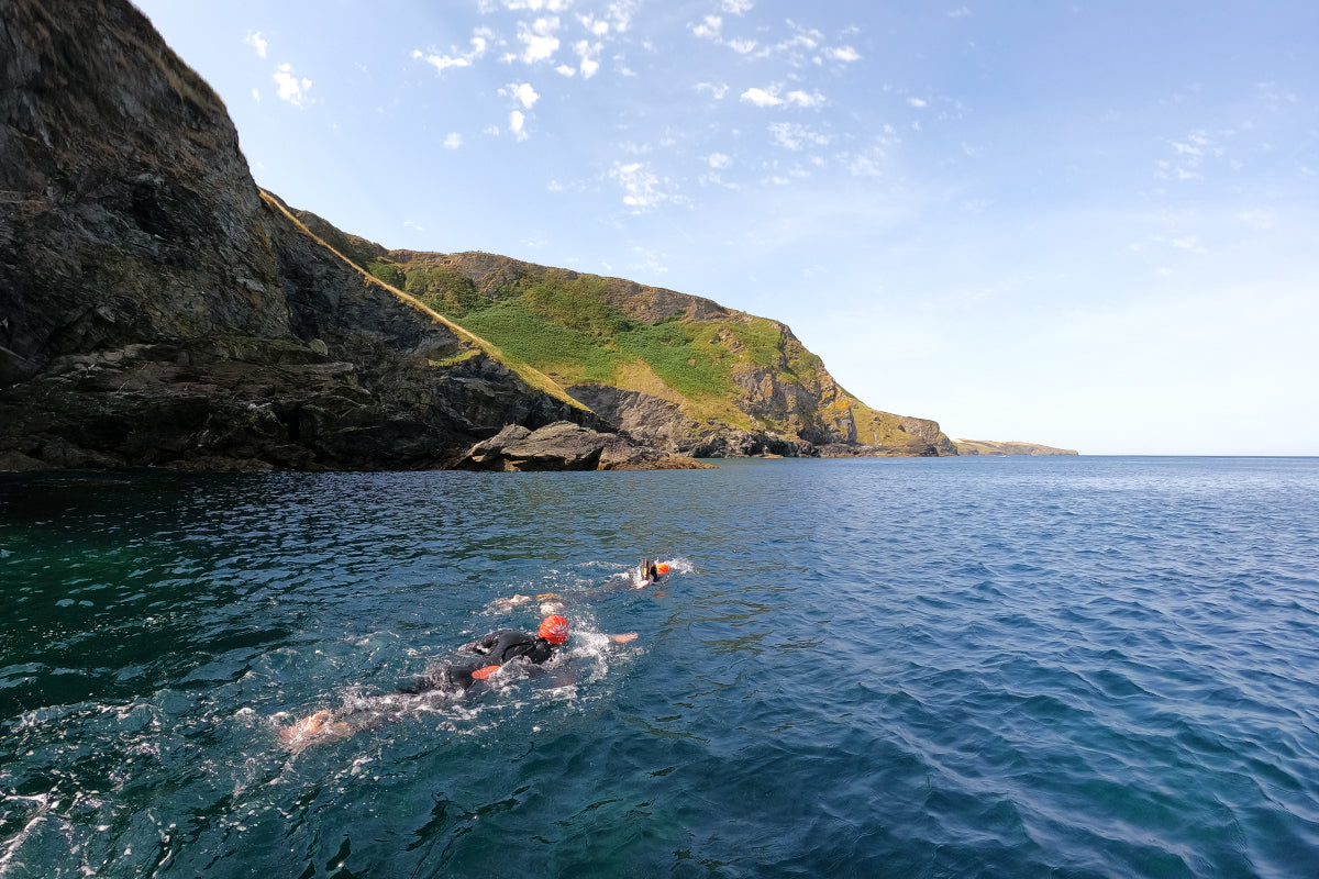 people swimming in the sea