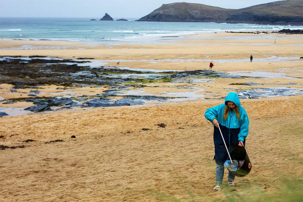 beach guardian member doing a litter pick on the beach
