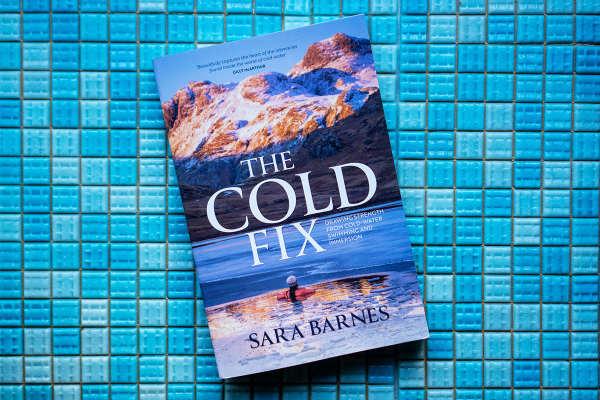 Sara's book The Cold Fix lies against a swimming pool tile blue background