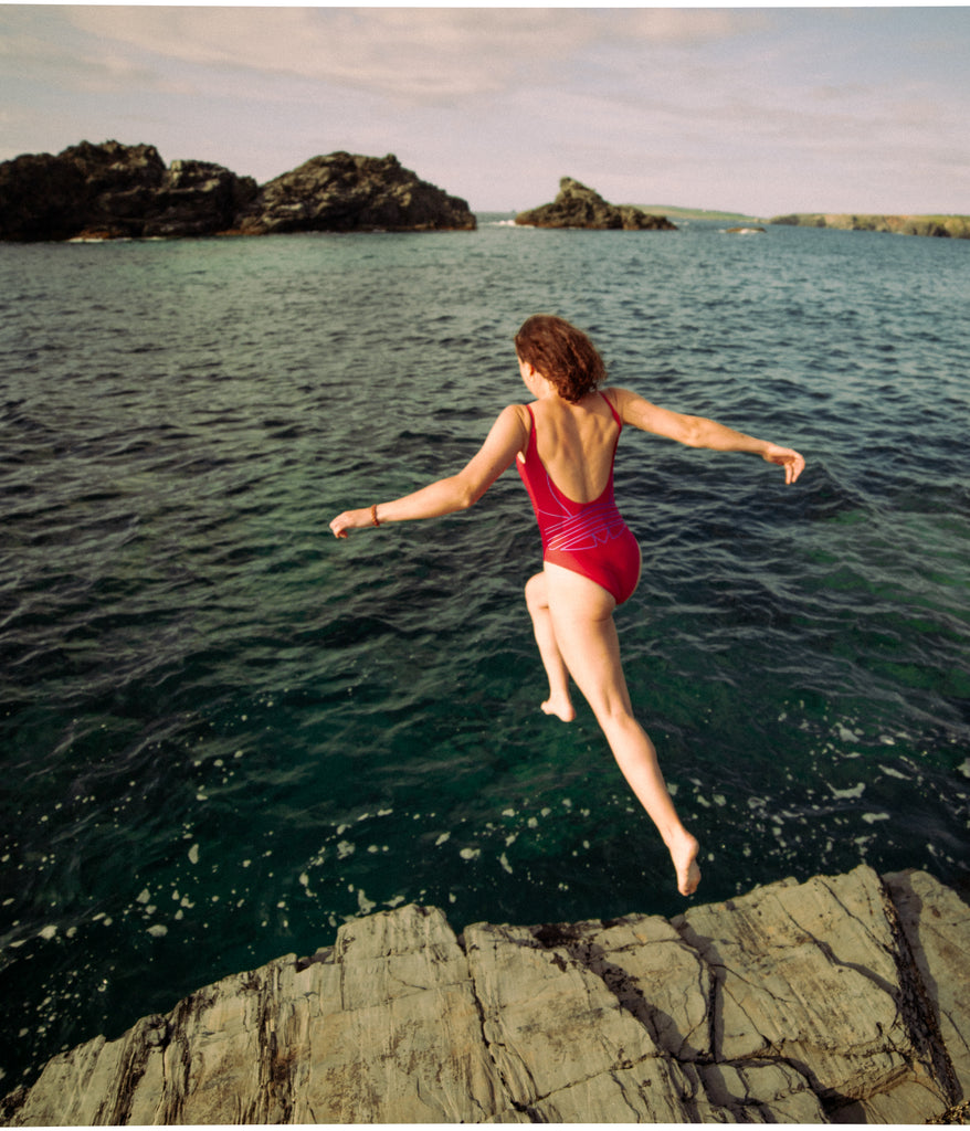 Lydia jumping into the water