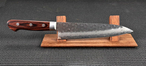Ohishi VG10 Damascus Handmade 180mm Gyuto (Chef/Cook) Japanese kitchen knife with Western style Mahogony Handle on a Red wood stand