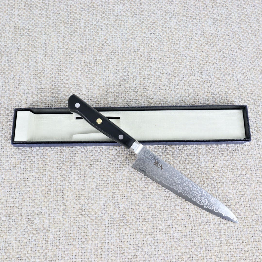 https://cdn.shopify.com/s/files/1/0510/3032/7472/products/OhishiClassicPowderedMetalDamascus150mmPettyonPackaging_1200x1200.jpg?v=1648637306