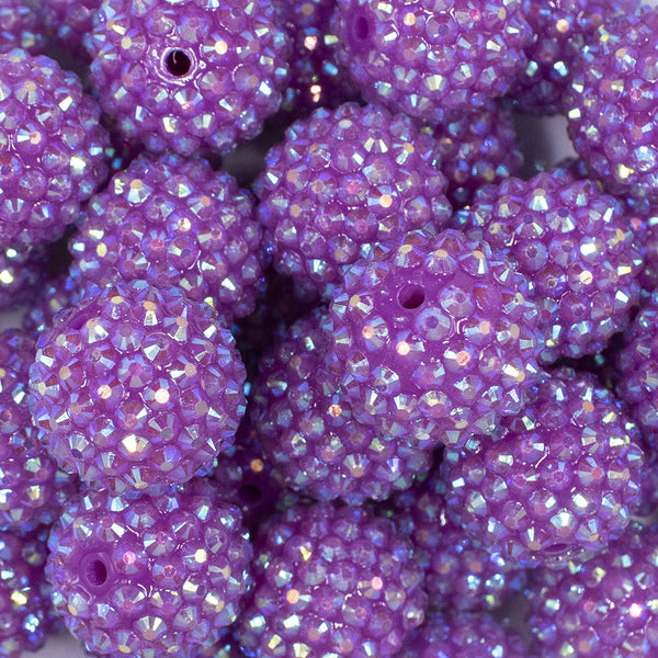 close up view of a pile of 20mm Neon Purple Rhinestone AB Bubblegum Beads