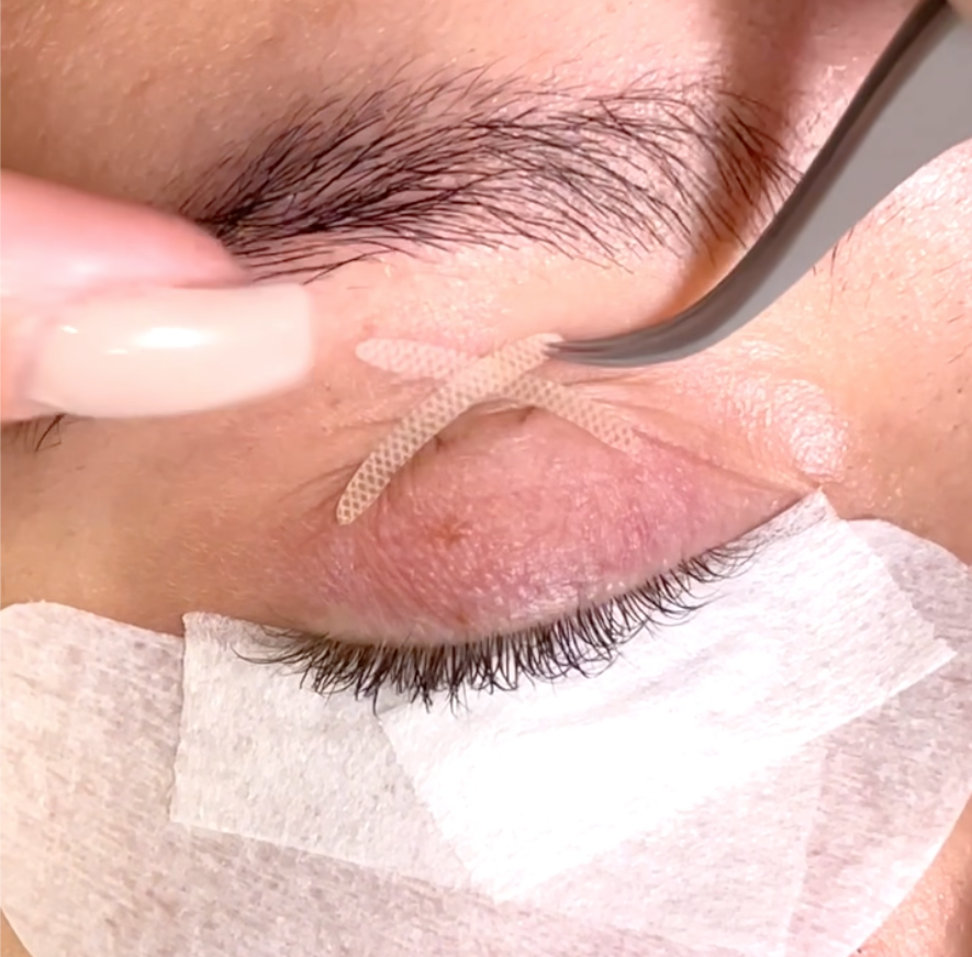 Criss Cross Placement of Eyelid Strips on Lash Extensions Eyelid
