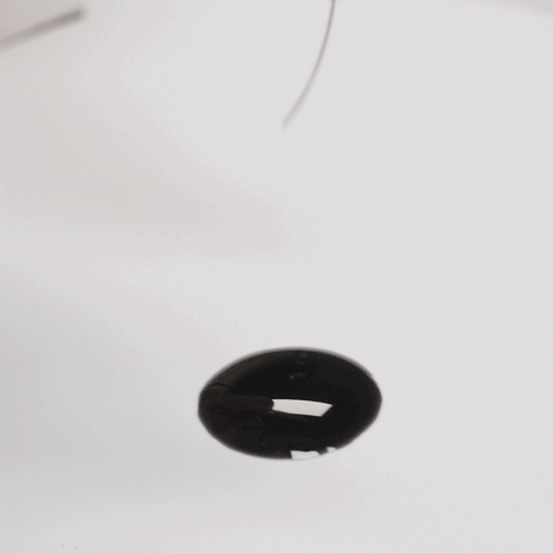 GIF Dipping Into Lash Glue