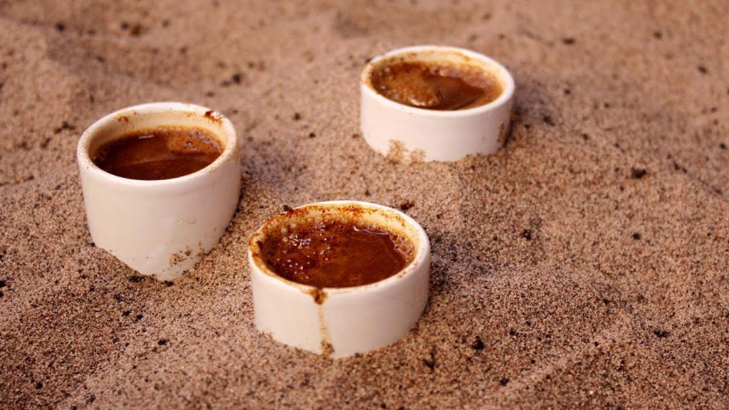 making Turkish coffee in the sand