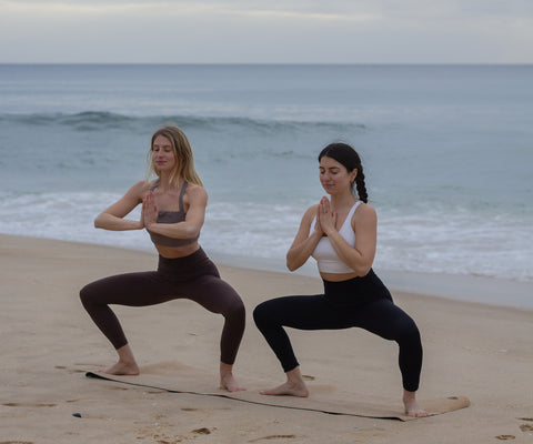 2 yogis on a cork yoga mat