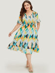 Shirred Pocketed Geometric Print Dress With Ruffles