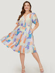 Geometric Notched Pocket Shirred Flutter Hem Dress