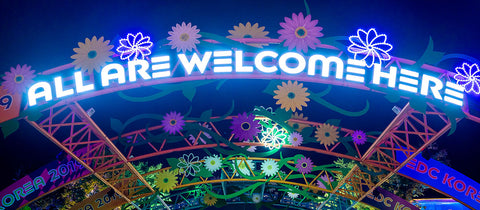 EDC welcome sign lit up at night