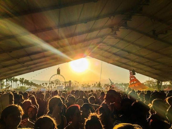 the Coachella festival crowd at sunset