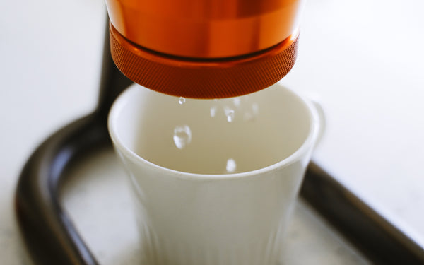 Water dripping from espresso machine